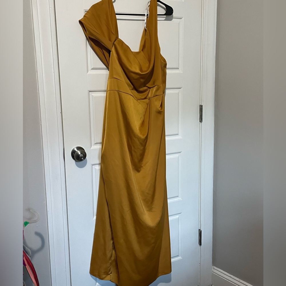 ASOS Design curve one shoulder satin maxi dress with pleat detail in gold.